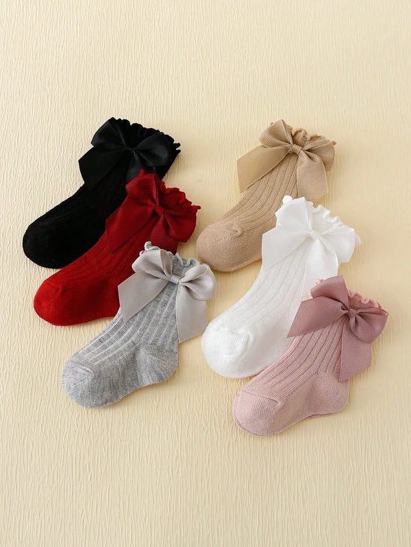 6 pairs of Rowan Bow lace baby bubble mouth socks